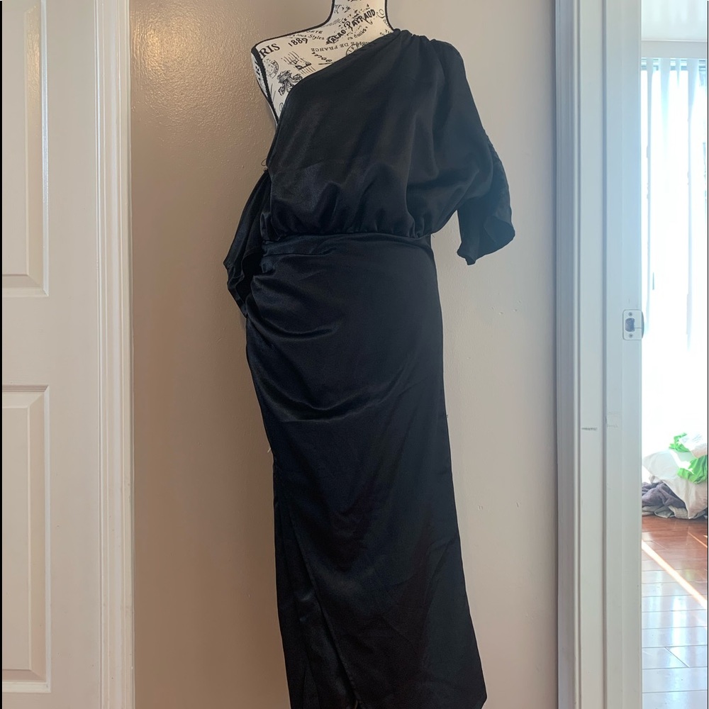 Off the shoulder black silk dress